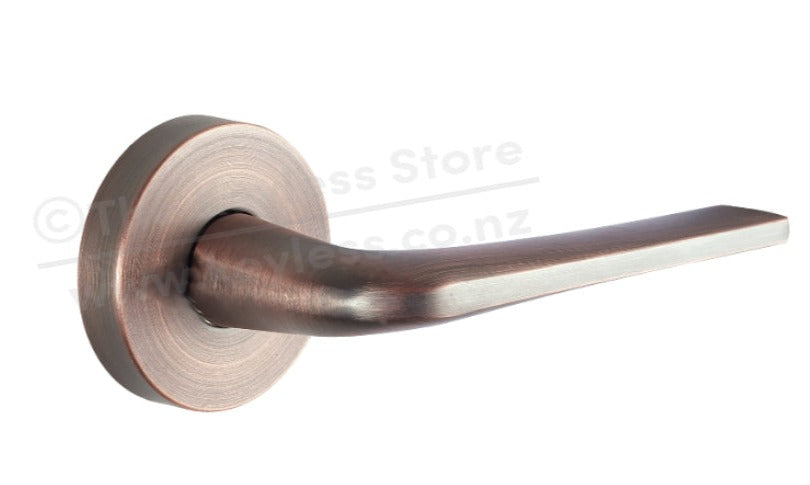 Schlage Medio Series Sierra Door Lever Aged Brushed Copper